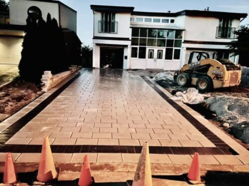 Landscaped backyard with retaining walls